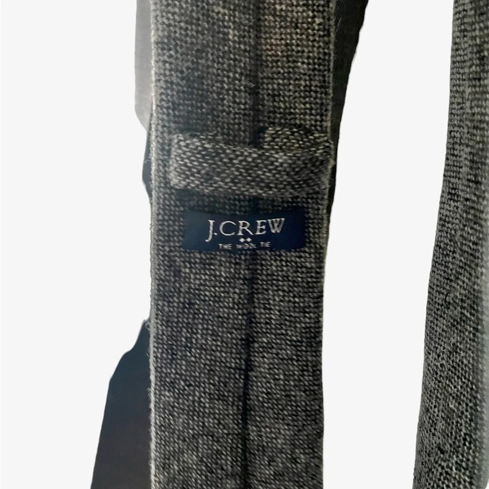 Mens suit by JCrew with pants and tie grey